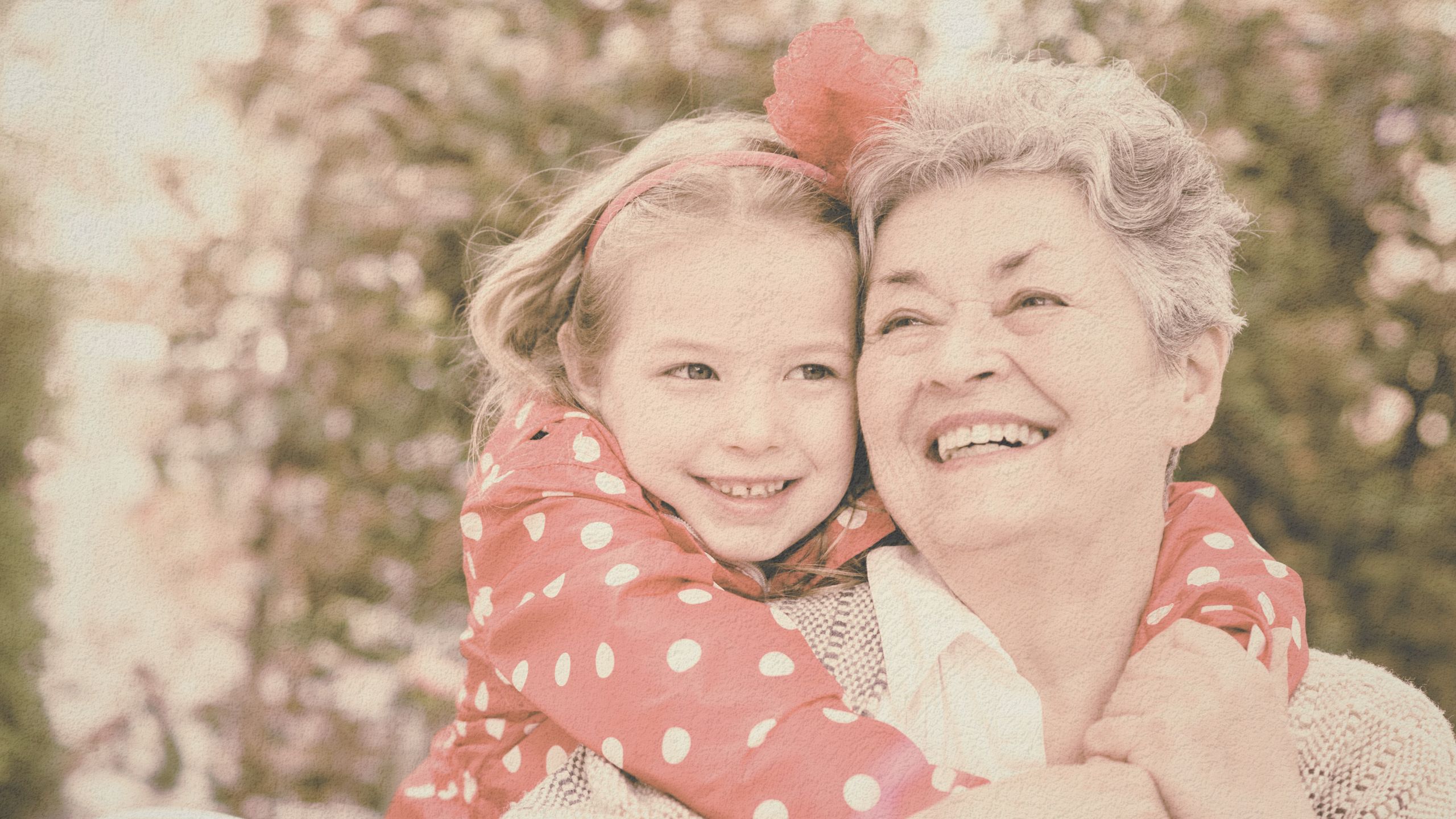 Grandma hugging her granddaughter